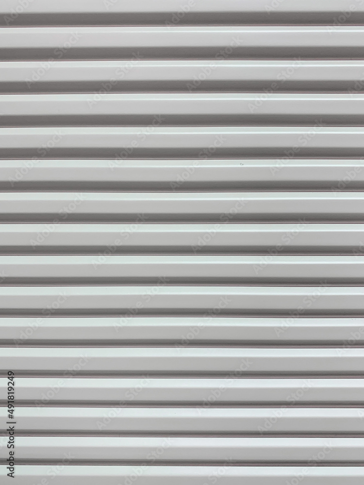 Obraz premium Gray wall with horizontal lines and blur
