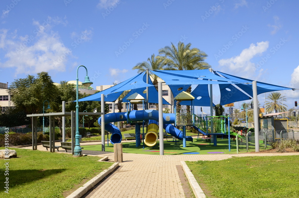 Empty playground in Israel. A beautiful space for children in the modern area of Rishon Lezion. Empty playground in Israel. A beautiful space for children in the modern area of Rishon Lezion.