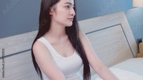 Attractive Asian beautiful irritated woman while using laptop at home. Asian young lesbian Lgbt relationship and travel concept for stock footage.