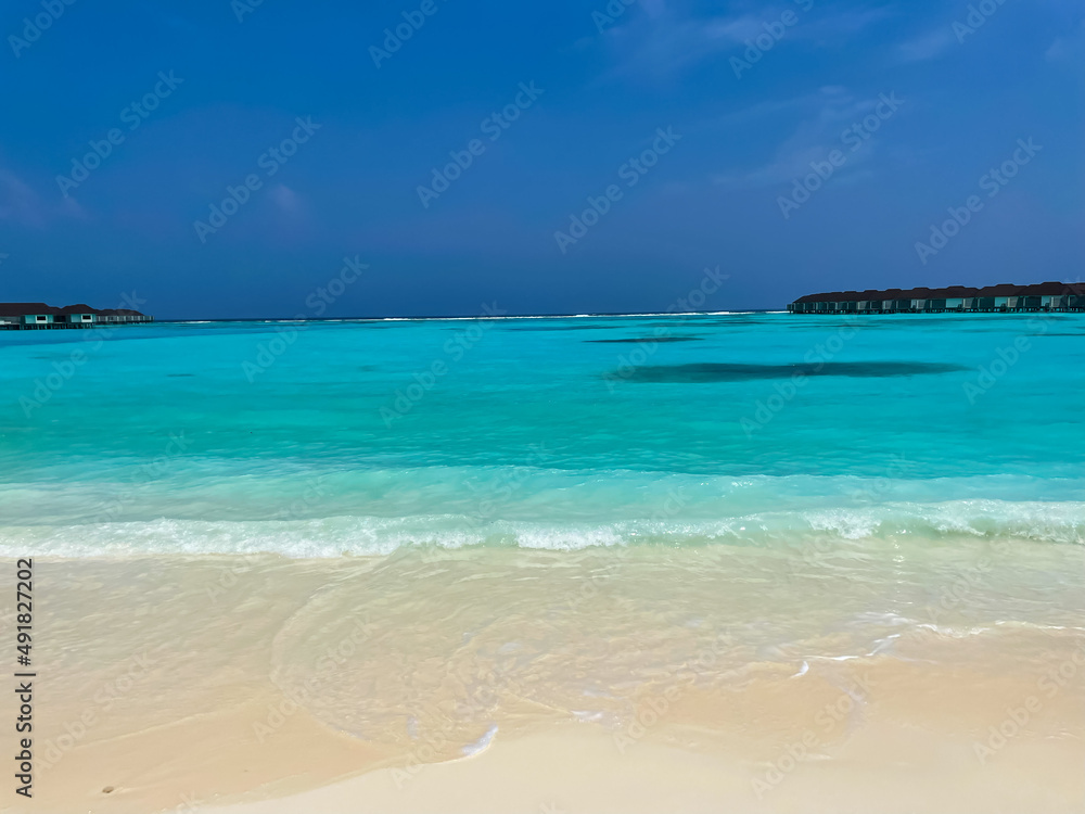 Maldives tropical beach with blue sea and beach