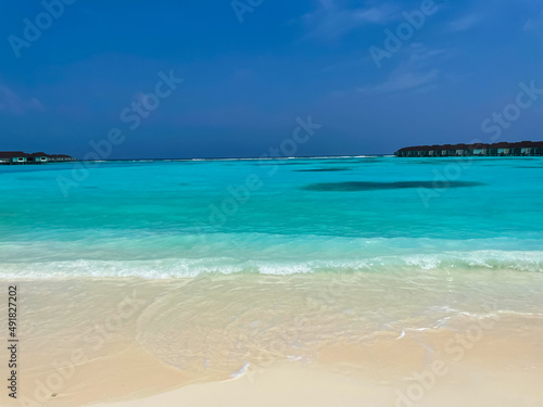 Maldives tropical beach with blue sea and beach © Antonina