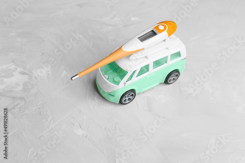 Toy car with a thermometer on the roof