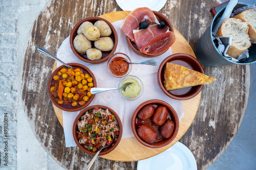 Bild auf Leinwand Meal of six tapas, on an outdoor terrace