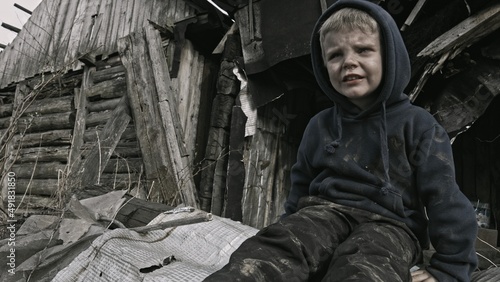  A child is crying in the ruins © Sergey