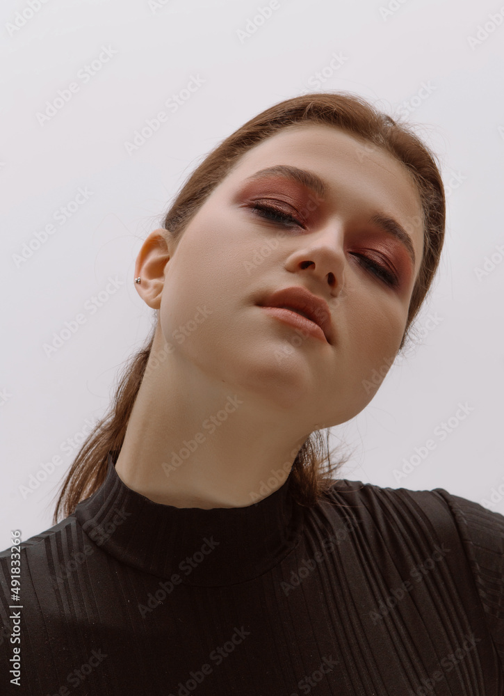 Art portrait of a girl with an unusual appearance, creative hair and makeup Art portrait of a girl with an unusual appearance, creative hair and makeup