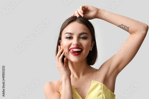 Happy woman with red lips s...