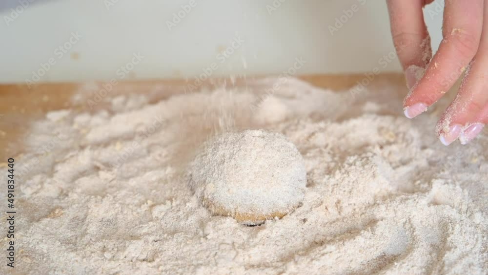 Woman preparing cake with flour and eggs at home Woman preparing cake with flour and eggs at home