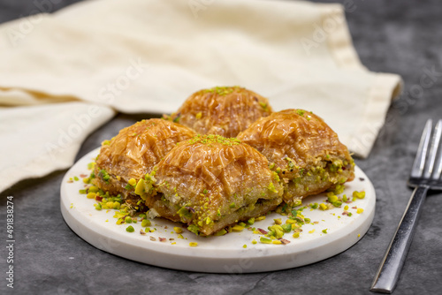 Pistachio baklava. Close-up. Traditional Middle Eastern Flavors. Traditional Turkish baklava. local name fistikli baklava