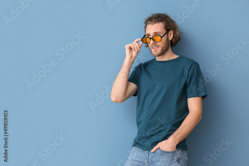 Handsome young man in styli...
