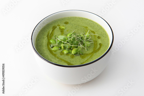 Cream soup with broccoli and spinach. Healthy food. Vegetarian soup. Healthy lifestyle. Lean menu. Isolated object. Photo on a white background.Isolated object.