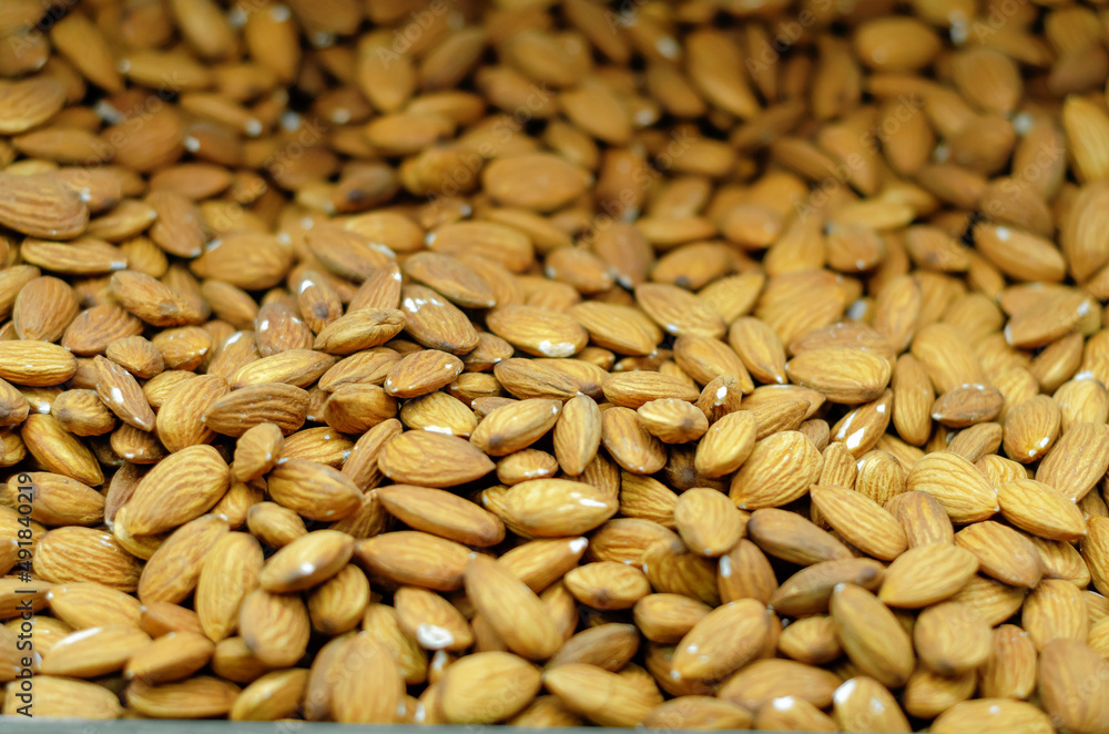 Background of dry almonds. Dry almond sales. Nuts. Healthy Eating. Background of dry almonds. Dry almond sales. Nuts. Healthy Eating.