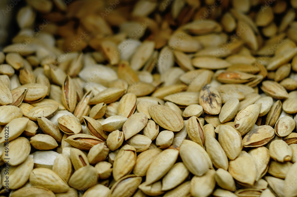 Background of dried pistachios. Sale of dried pistachios. Nuts. Healthy Eating. Background of dried pistachios. Sale of dried pistachios. Nuts. Healthy Eating.