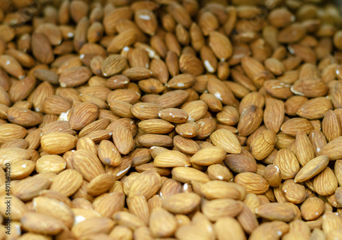Background of dry almonds. Dry almond sales. Nuts. Healthy Eating.