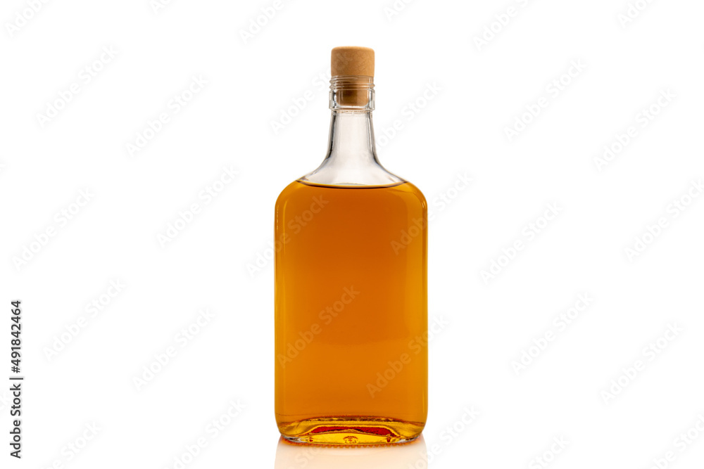 Bottle of whiskey or scotch whiskey or bourbon or brown rum isolated on white, copy space Bottle of whiskey or scotch whiskey or bourbon or brown rum isolated on white, copy space