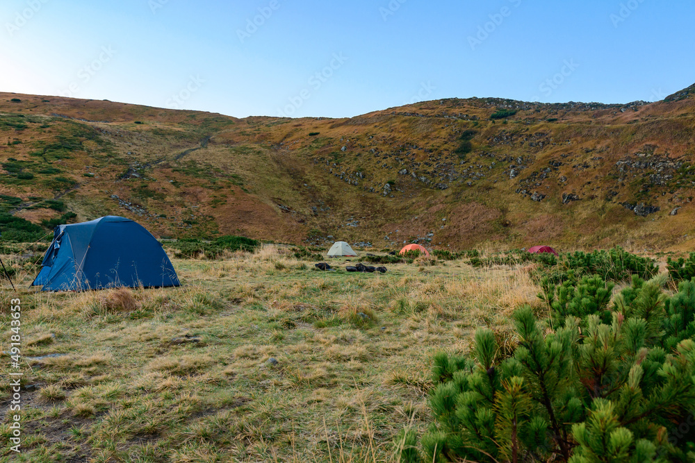 Tent camp near Lake Nesamovyto, morning in a camp town in the mountains.