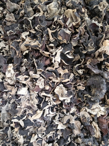 Dried black mushrooms are sold in the market, for cooking