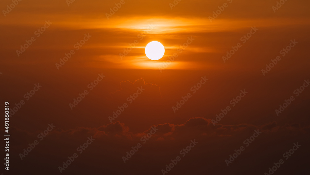 Big sun over the cloud at sunrise time on the morning. Big sun over the cloud at sunrise time on the morning.