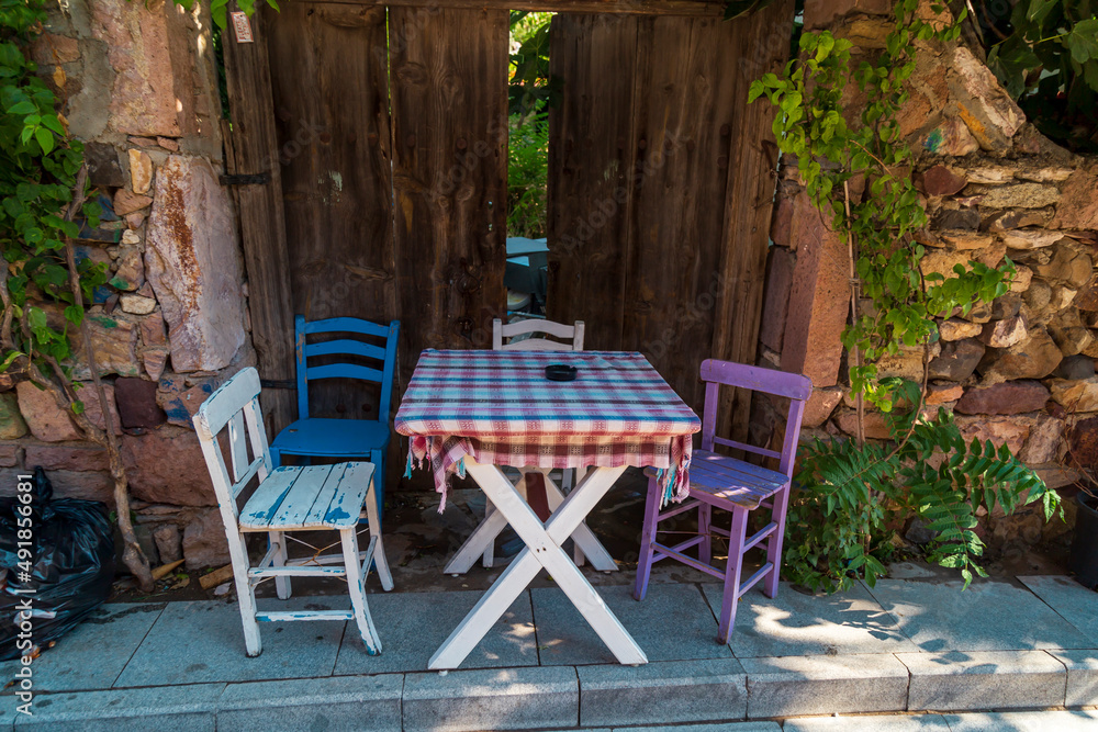 Restaurants and  stone buildings of Cunda Island, is a typical Aegean resort town. Cunda Island off the coast of Ayvalik, Balikesir Province. Turkey.