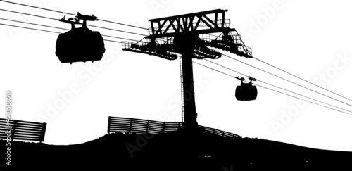 silhouette cableway tower with cabin