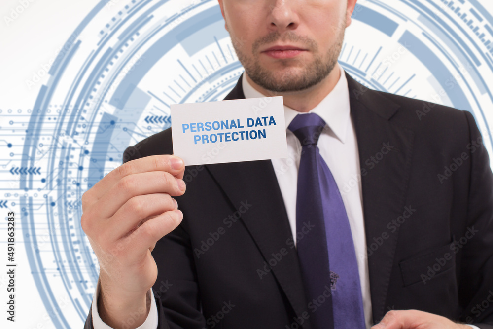Business, technology, internet and network concept. Young businessman thinks over the steps for successful growth: Personal data protection Business, technology, internet and network concept. Young businessman thinks over the steps for successful growth: Personal data protection