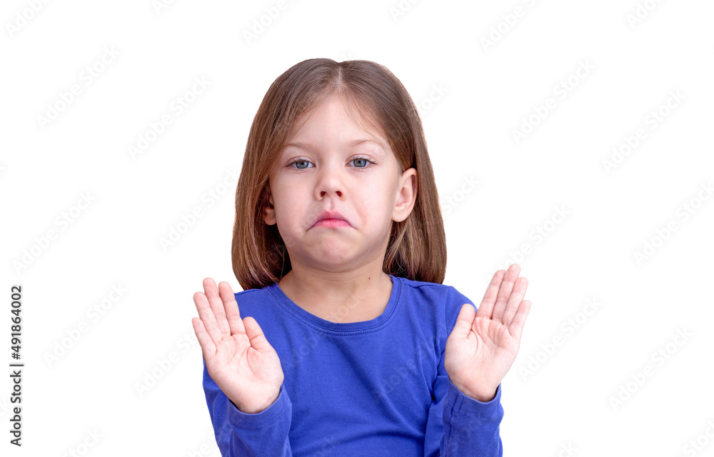 Child holding arms showing that not guilty, isolated on white background looking at camera waist up caucasian little girl of 5 years in blue Child holding arms showing that not guilty, isolated on white background looking at camera waist up caucasian little girl of 5 years in blue