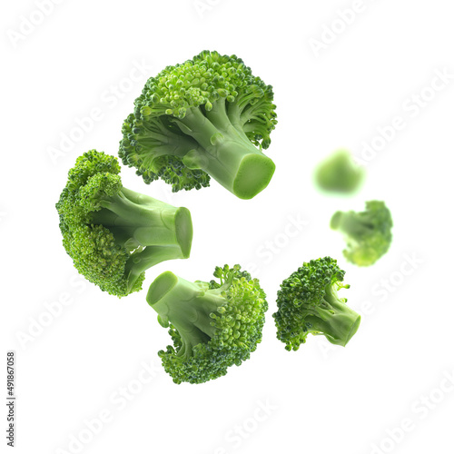 Green broccoli levitating on a white background