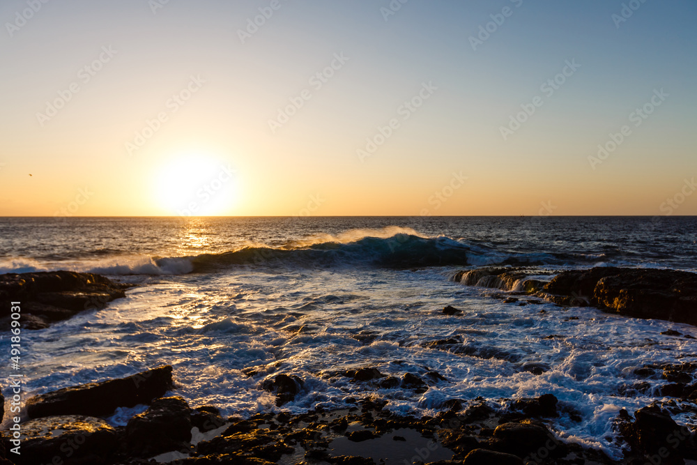 quiet sea coast with stones at the twilight, natural sea background