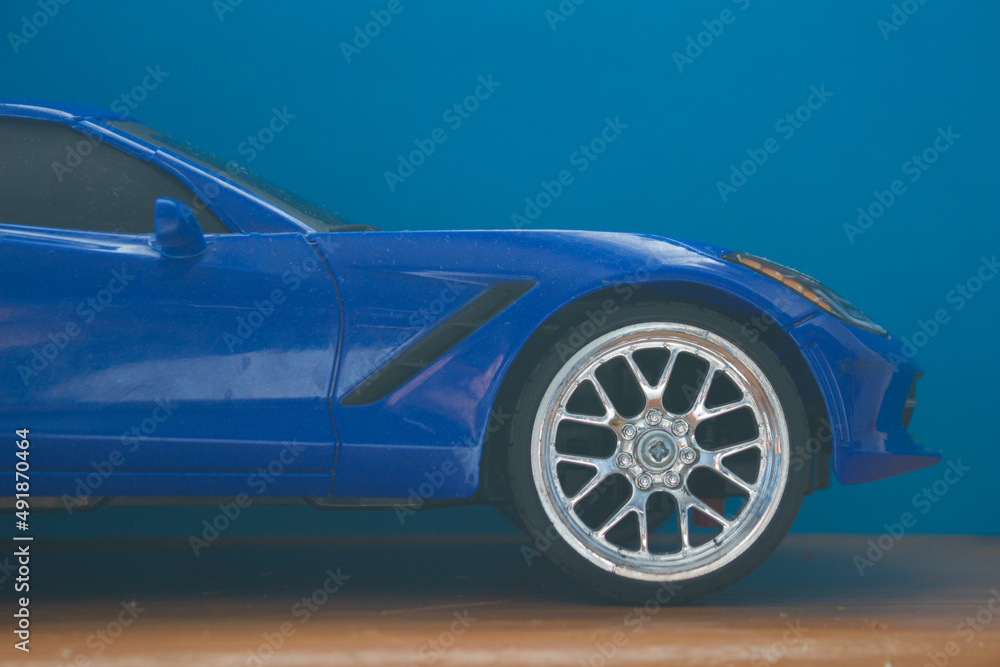 Toy car in vivid blue color Toy car in vivid blue color