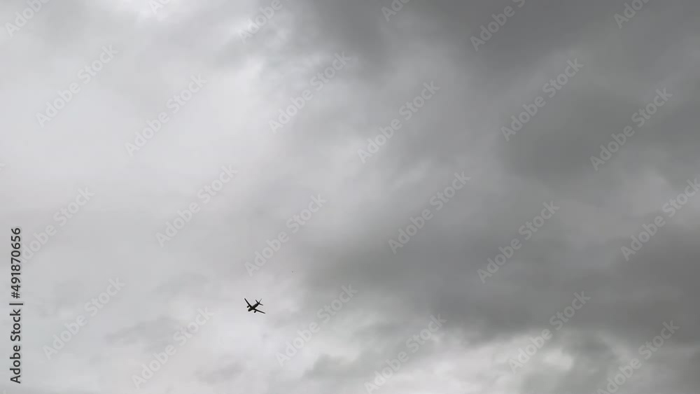 Commercial passenger airplane flying overhead Commercial passenger airplane flying overhead
