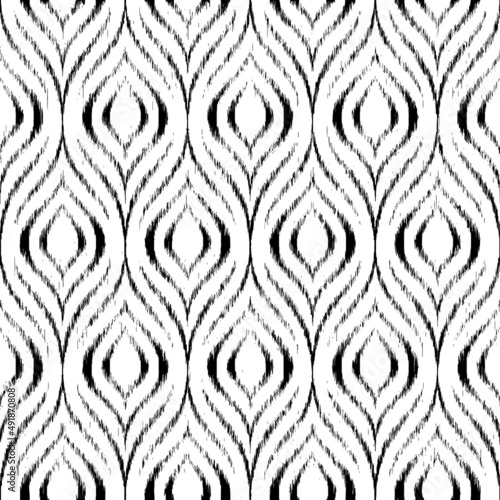 Ikat seamless pattern. Black ogee texture on white background. Repeated navajo pattern. Repeating traditional motif for design prints. Bohemian ornament. Ethno tribal textile. Vector illustration