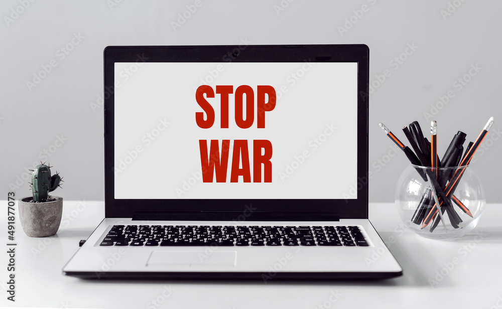 the inscription on the laptop stop the war the inscription on the laptop stop the war