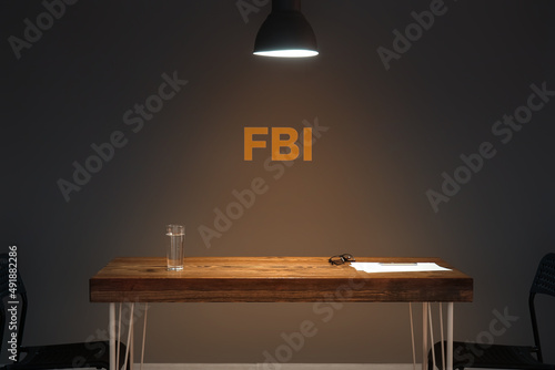 Foto Table in dark interrogation room