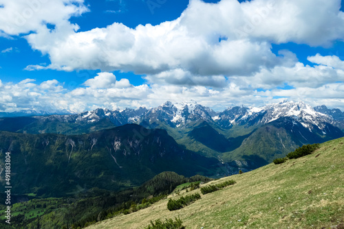 Panoramic view in spring from Frauenkogel on mount Mangart in the Julian Alps  Friuli  Italy. Border Austria  Italy  Slovenia. Triglav National Park. Upper Drava valley. Summit