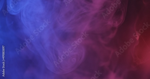 Smoke on black background with red and blue colors