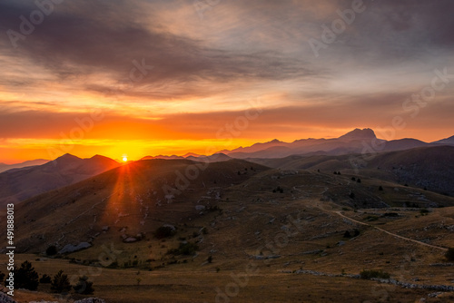 Sunset with sunburst over Gran Sasso National Park, Abruzzo Italy