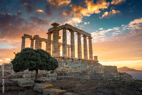 The Temple of Poseidon at Cape Sounion at sunset, over the Aegean Sea, Greece