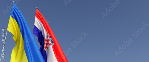 Flags of Croatia and Ukraine on flagpoles on sides. Flags on blue background. Place for text. Independent free Ukraine. Croatian flag. Zagreb. Commonwealth. 3D illustration. photo