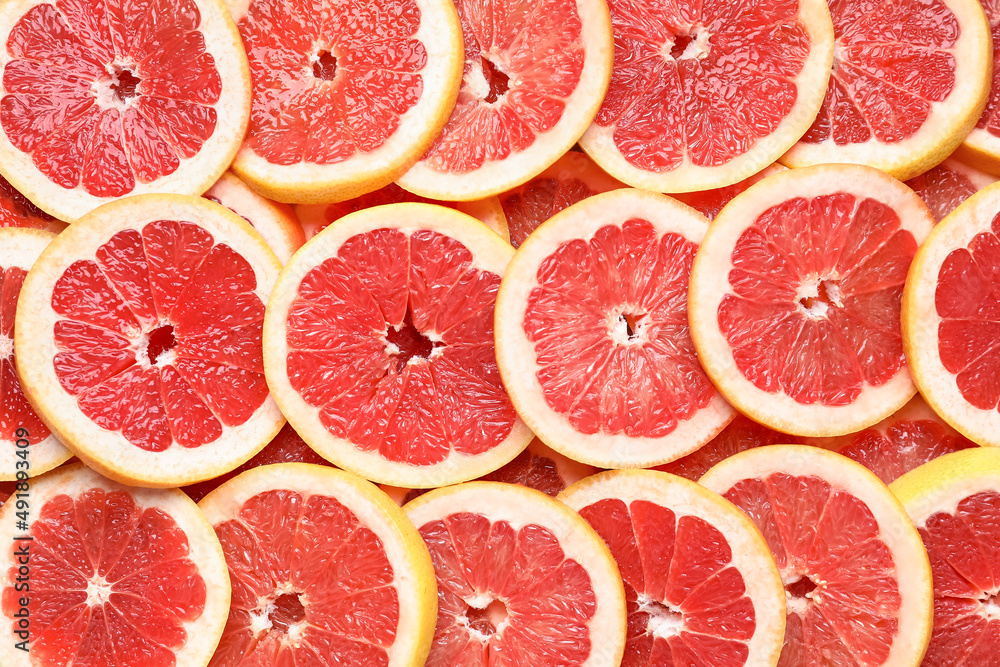 Slices of fresh grapefruit as background Slices of fresh grapefruit as background