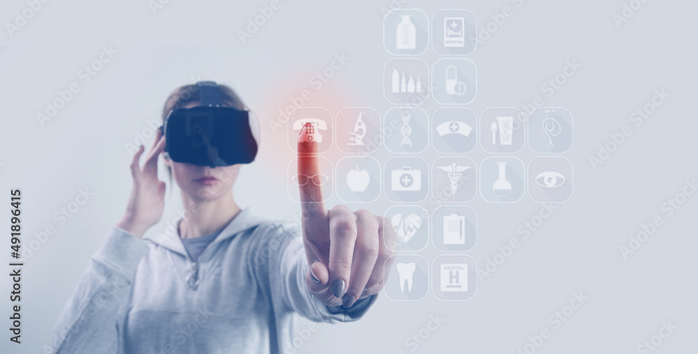 Portrait of woman with VR glasses having quick access to healthcare specialists. Improvement and remodeling healthcare industry through virtual reality experience and future technology concept. Portrait of woman with VR glasses having quick access to healthcare specialists. Improvement and remodeling healthcare industry through virtual reality experience and future technology concept.