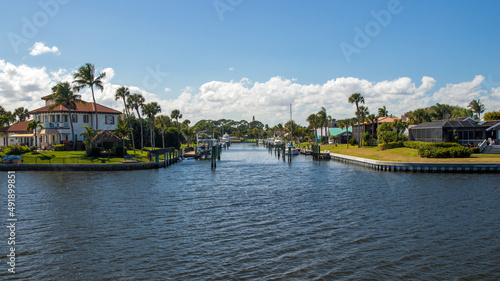 Channels with boats along the Indian River in Floriday photo