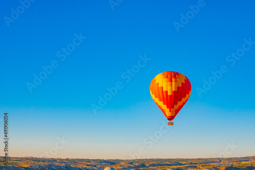 Hot air balloon on the sky. Cappadocia background photo. © senerdagasan