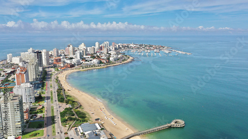 Aerial view of Punta del Este Playa Mansa beach with modern buildings and boats. Punta del Este, Maldonado State, Uruguay