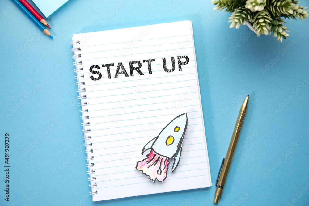 start up text on page with rocket start up text on page with rocket