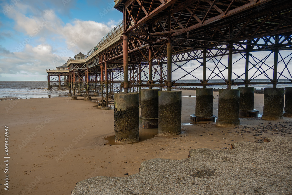 Cromer beach on the North Norfolk Coast captured beside the Victorian pier on a bright and sunny but cold winter’s day Cromer beach on the North Norfolk Coast captured beside the Victorian pier on a bright and sunny but cold winter’s day