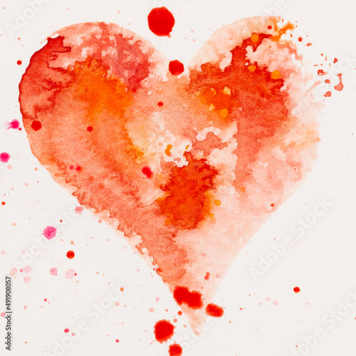 Watercolor painted pink heart, on the white watercolor paper.