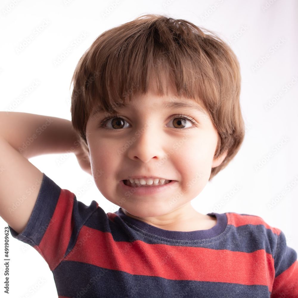 little boy making funny expressions and posing with many faces and thinking little boy making funny expressions and posing with many faces and thinking