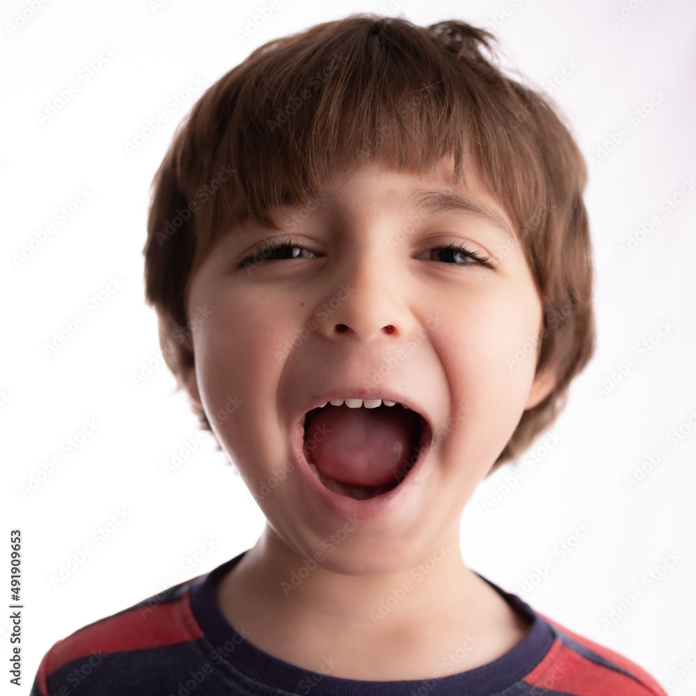 little boy making funny expressions and posing with many faces and thinking little boy making funny expressions and posing with many faces and thinking