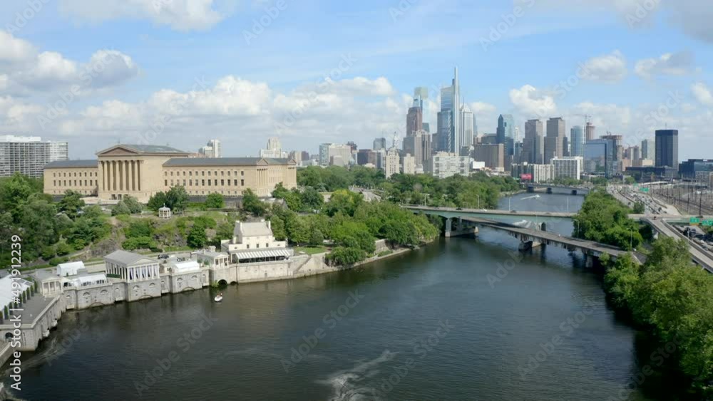 Beautiful Shot of the Philadelphia Skyline with the Art Museum and the Schuylkill River in the Foreground, Forward Drone Movement Beautiful Shot of the Philadelphia Skyline with the Art Museum and the Schuylkill River in the Foreground, Forward Drone Movement