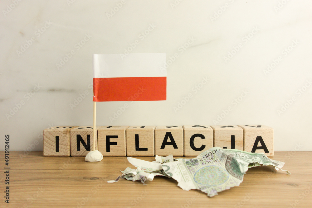 Φωτογραφία Text inflation in Polish with flag of Poland and destroyed hundred Zloty banknot