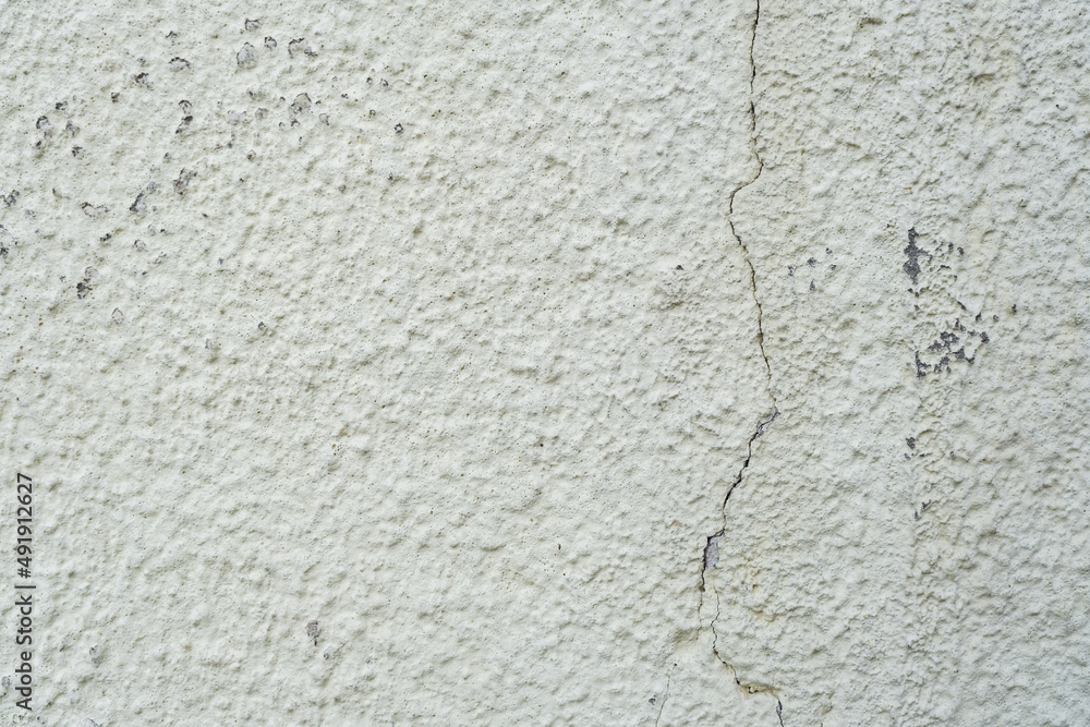 surface of concrete gray wall  in cracks